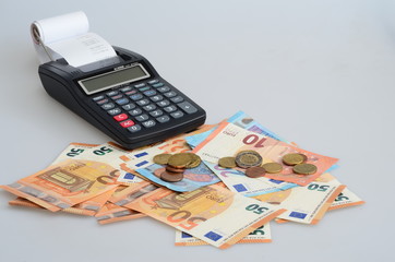 Calculator and euro cash bank notes