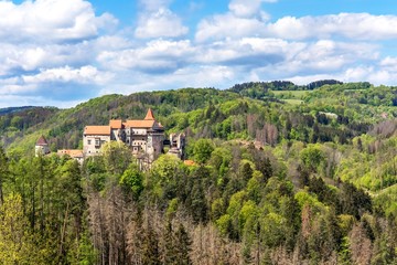 Medieval castle of Pernstein on a hill in the forest. Built in the middle of the 13th century.  Czech Republic.
