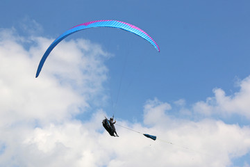 Paraglider being towed on a winch launch	