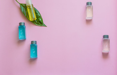 Spa cosmetics set. Copyspace for text. Top view. Flatlay on pink background.