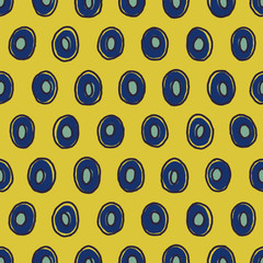 Colorful seamless pattern with blue ovals and yellow background