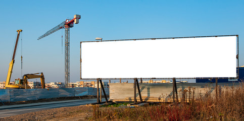 Blank white advgertising billboards on the construction site © diesirae