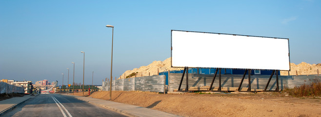 Blank white billboard for advertisement on the construction site © diesirae