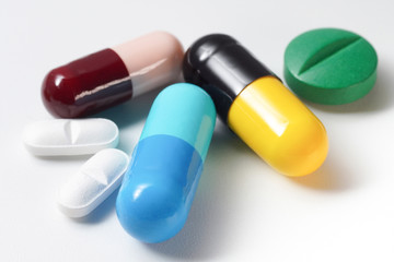 Macro ..Close up Many Drug tablet on white background