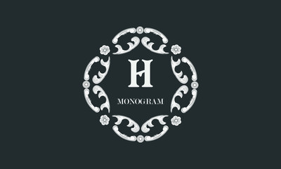 Vintage flower monogram with the letter H. Exquisite three-dimensional logo. Luxury frame for business sign, label, boutique brand, hotel, restaurant, heraldry.