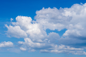 Naklejka na ściany i meble blue sky with clouds. blue sky background with tiny clouds