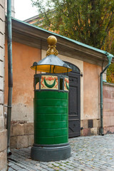 Fototapeta na wymiar An old public toilet in the old center of Stockholm
