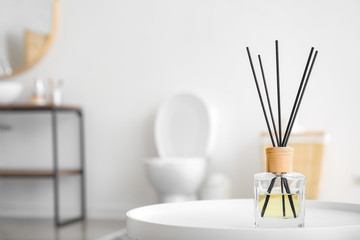 Reed diffuser in modern bathroom