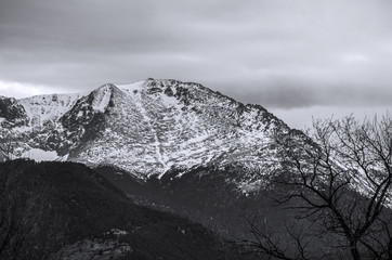 Black and white view of Pikes Peak from a residential neighborhood in Colorado Springs, Colorado on early spring