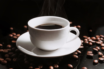 A cup of coffee, great design for any purposes. Coffee beans background. Morning drink. White background. Hot drink.