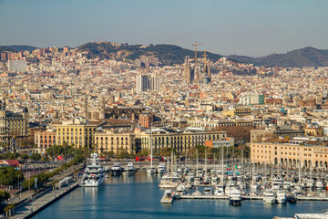View of Barcelona city with Sail boats in Barcelona Harbour in the Fore ground, 