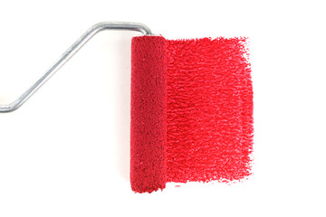 painting roller and red smear on a white background
