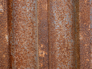 The texture is rusty, old, metal fence. Background
