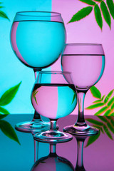 A glass of water, distortion and refraction of light. Modern line art banner with distortion on a...