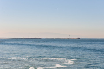 Plane in the sky in Venice Beach location, LA, CA