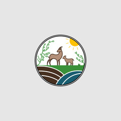 Illustration logo of a goat on a hill at sunset/sunrise.