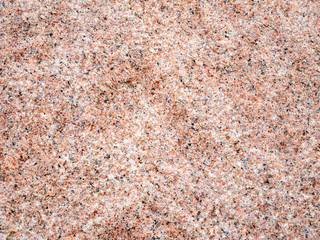 The structure of granite is in the cut stone texture.