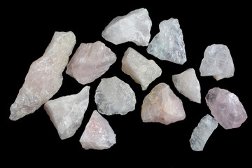A few samples of Pink Quartz Rock isolated on white background. Mineral of volcanic origin