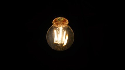 light bulb on black background