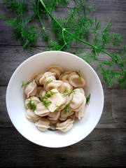 Russian Pelmeni with butter and dill