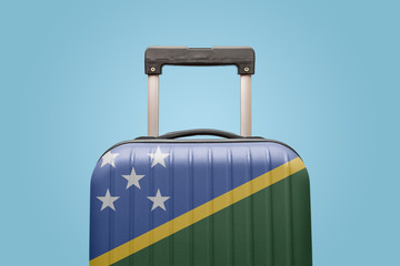 Baggage with Solomon Islands flag print tourism and vacation concept.