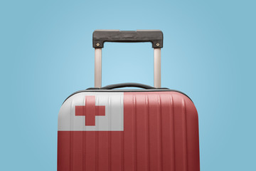 Baggage with Tonga flag print tourism and vacation concept.