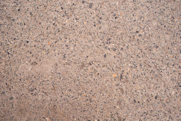 The texture of the wall is made of cement with stone chips. architecture, part of the structure.