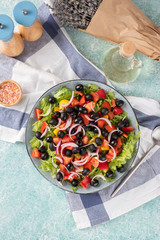 A large plate of greek salad.