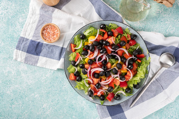 A large plate of greek salad.