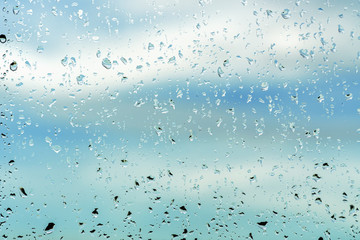 Backdrops for your artwork: Raindrops on the glass against the sky