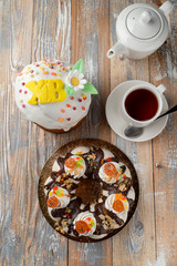 An assortment of orthodox easter cakes, traditional russian easter cakes on wooden table on wooden table, top view