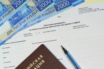 Declaration campaign based on the results of the year. the Tax Declaration on the tax to incomes of physical persons, a Russian passport, pen and money