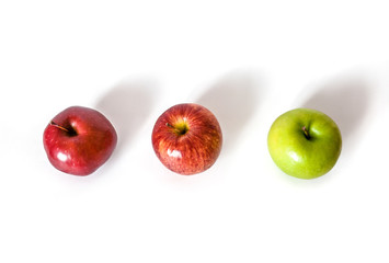 Fresh red and green apples on white background. Isolated. 
