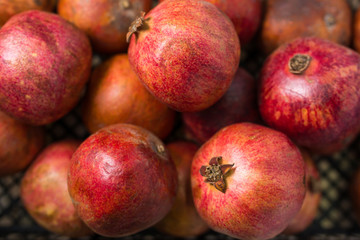 Bunch of ripe pomegranates in the store