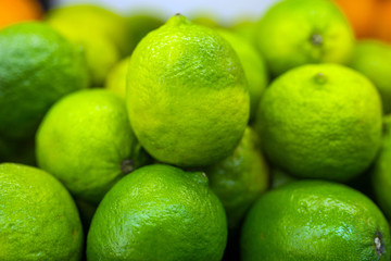 Limes on a shelf in a store