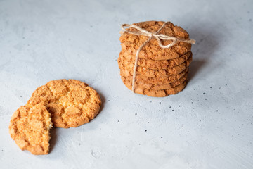 A stack of freshly baked cookies on a gray background. close-up. quick snack