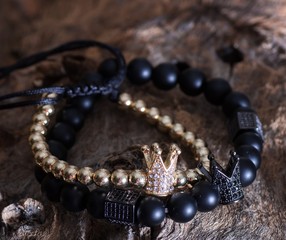 Stock Photo - bracelet with little crown 