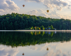 hot air balloon over lake