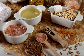 body oil, oatmeal, linseed, sunflower seeds, salt, aromatic oil in a small bottle and eye gel and a dropper for essential oils