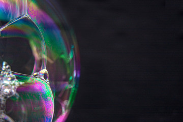 Set of soap bubbles isolated on black background. Studio Shot. With copy space text.