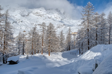 Obraz premium View Italian Alps and Matterhorn Peak under the clouds in December, Breuil-Cervinia, Valle d'Aosta, Italy 