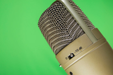 condenser microphone in a chroma key background