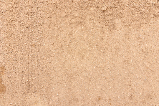 Top view sand background and texture on the beach. Abstract Sandy free space for text.