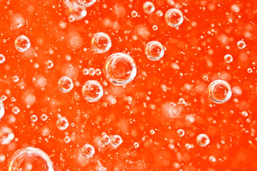 Macro bubbles of oxygen in the blood. Red-orange liquid.