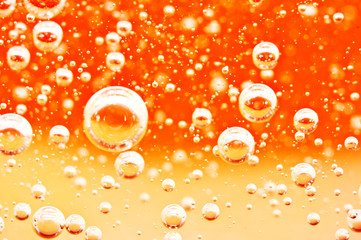 Macro bubbles of oxygen in the blood. Red-orange liquid.