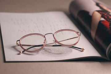 glasses and magazine
