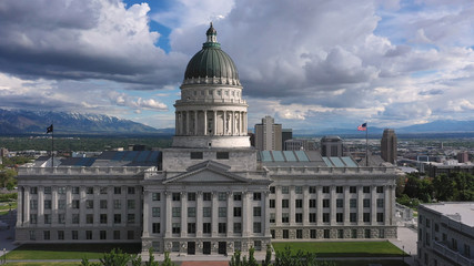 Fototapeta na wymiar Aerial rotating around the State of Utah Capitol Building looking towards downtown Salt Lake City.