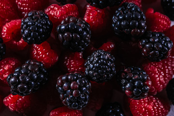Red berry closeup. Vegetarian healthy food. Nature background. Natural background. Green background. Fresh fruit. Food set.