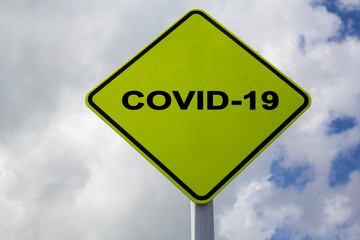 Sign with Covid-19 text