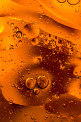 multicolored drops of oil in the water